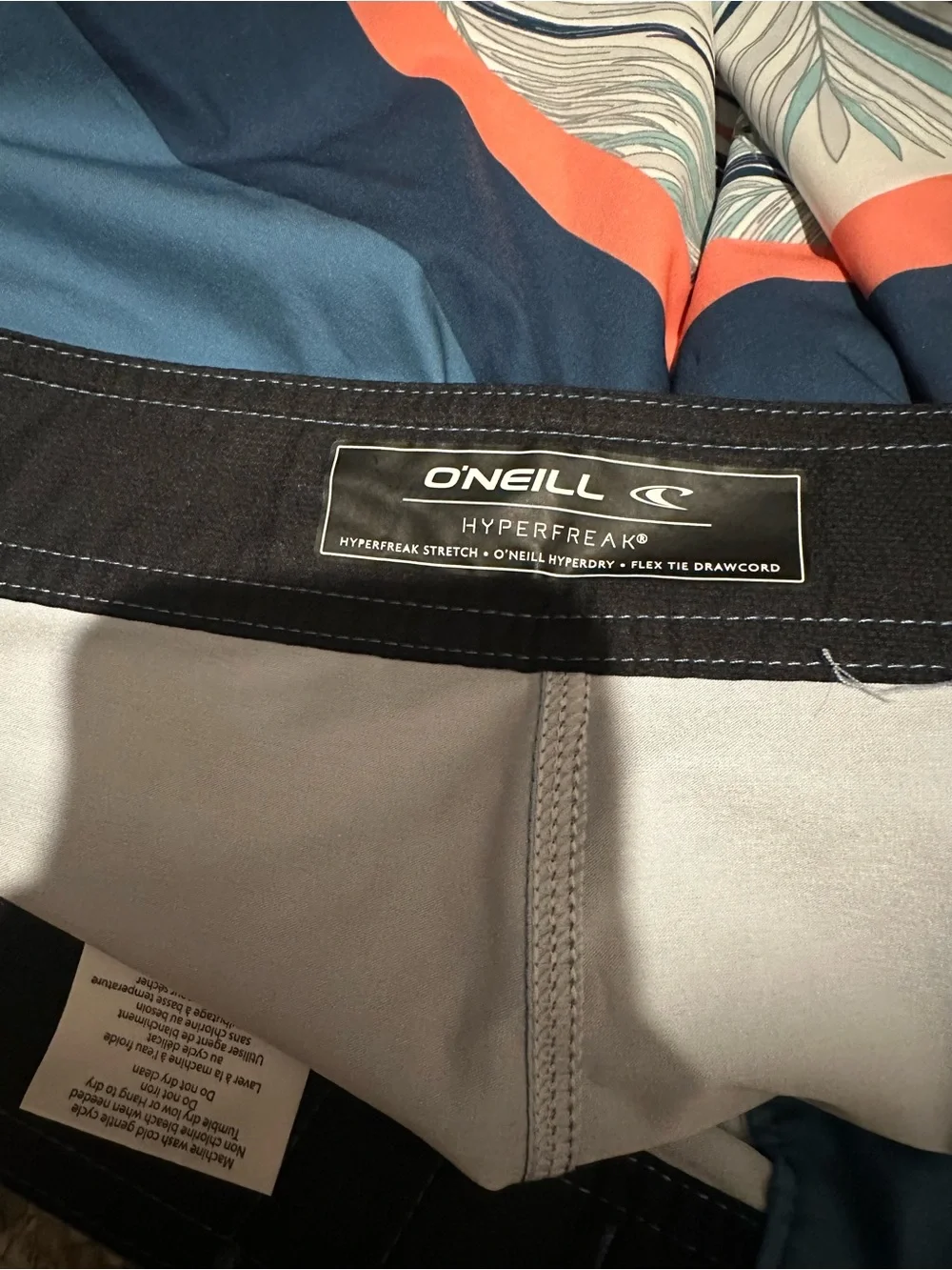 O'Neill Men's Teal and Navy Palm-Print Board Shorts with Coral Stripe